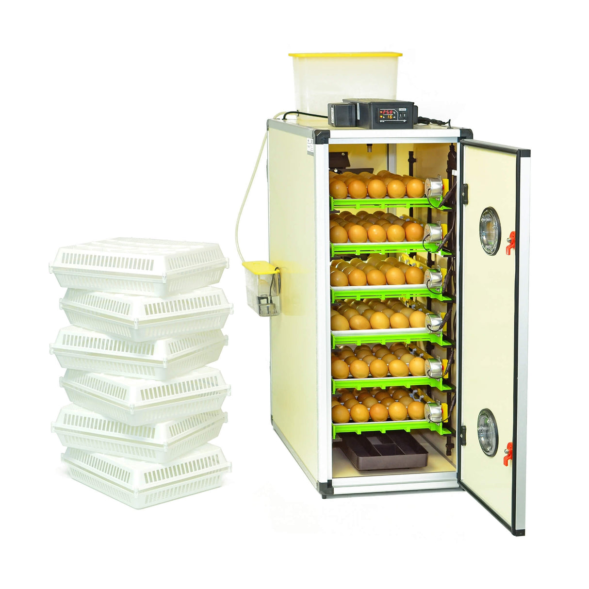 Hatching Time Cimuka CT180 egg setter and hatcher. Cimuka incubator is seen in image with the door open and full egg setter trays inside with brown eggs. A digital control is on top of the incubator in front of a water reservoir tank connected to a Humisonic Humidifier. White hatching baskets are beside the incubator.