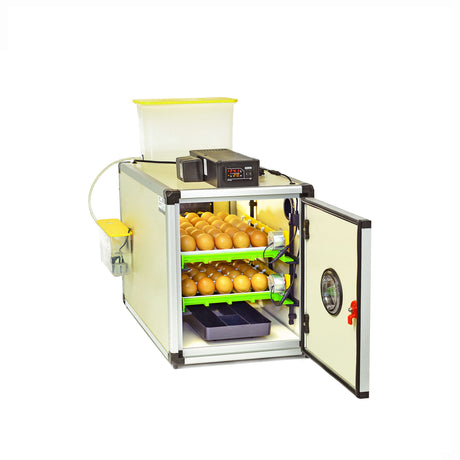 Hatching Time Cimuka CT series incubator shown with front door open to show 2 egg setter trays filled with brown chicken eggs inside. Digital control and water reservoir for humisonic humidifier on top of incubator.